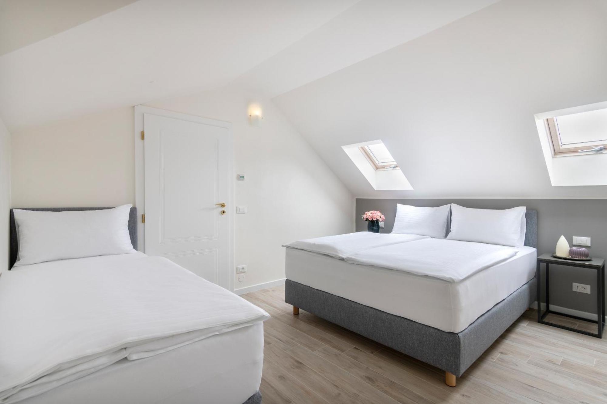 Kinsky Garden Apartments And Suites By Dwellfort Prága Szoba fotó