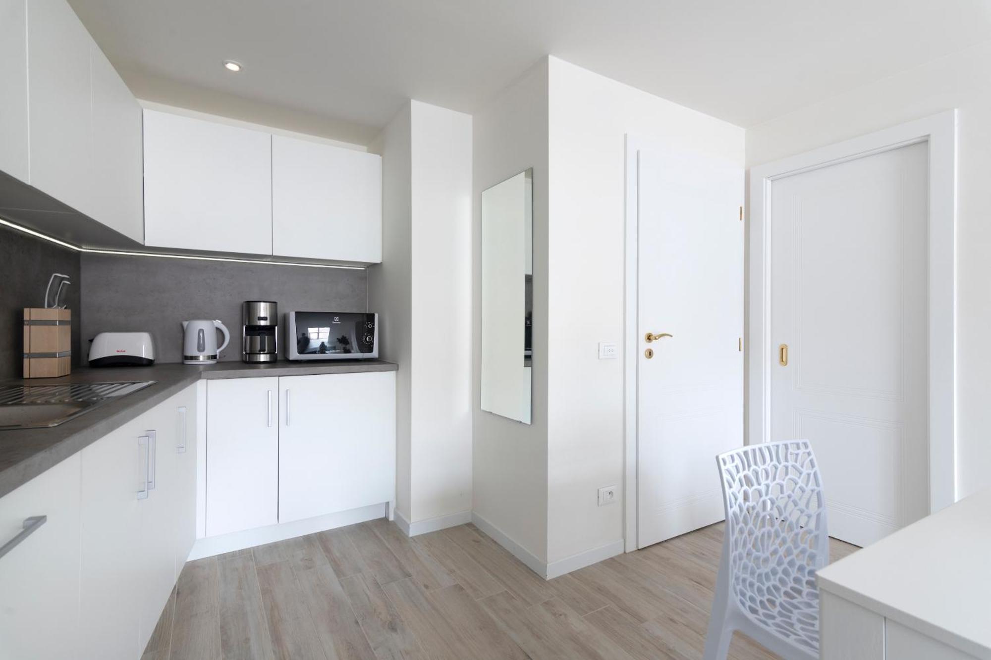 Kinsky Garden Apartments And Suites By Dwellfort Prága Szoba fotó