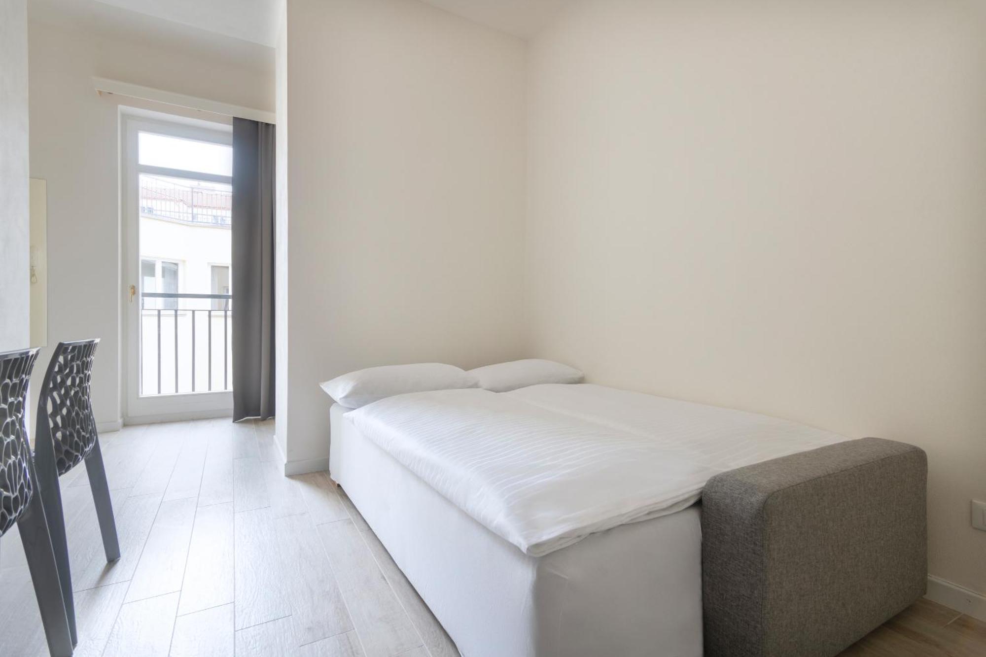 Kinsky Garden Apartments And Suites By Dwellfort Prága Szoba fotó