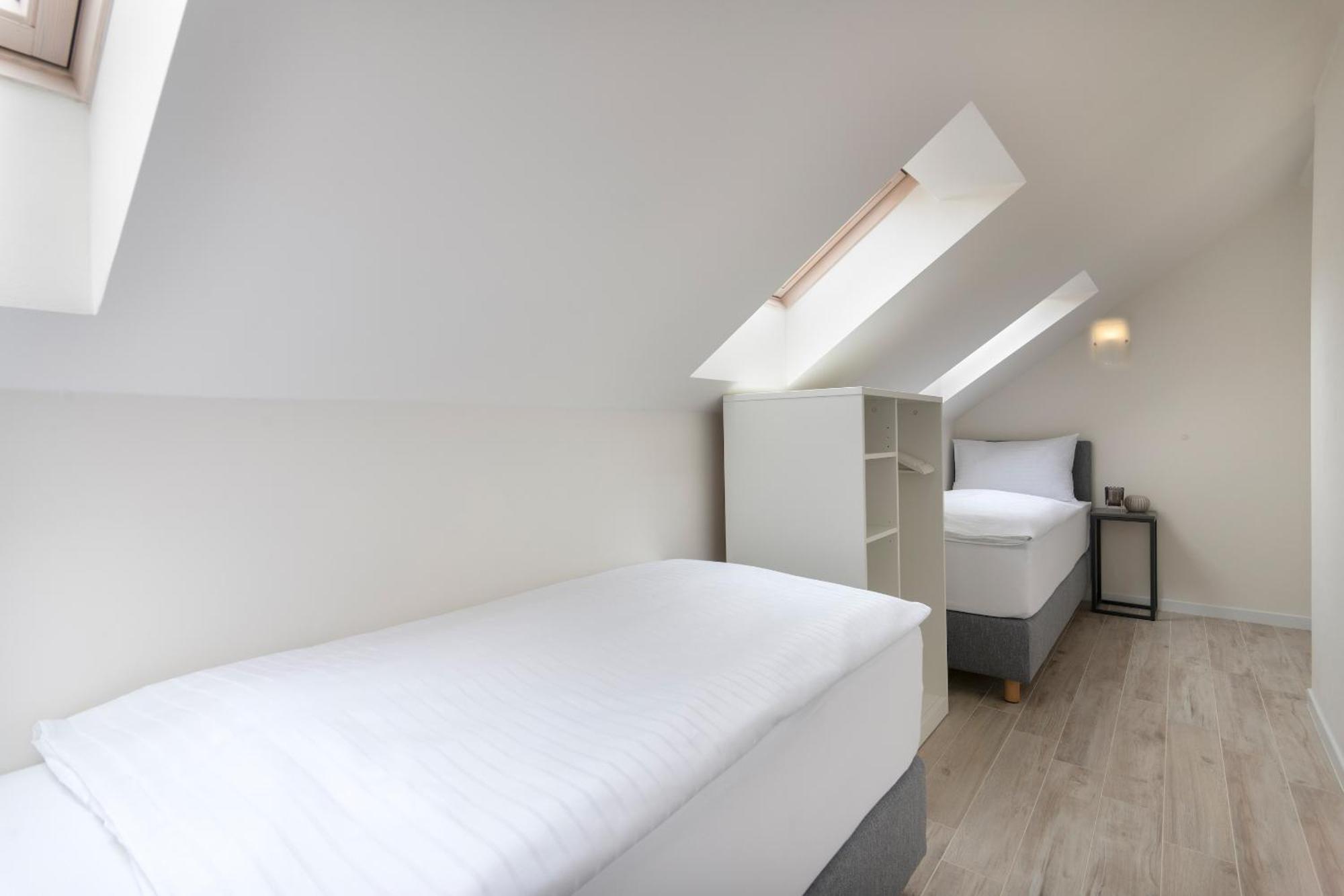 Kinsky Garden Apartments And Suites By Dwellfort Prága Szoba fotó