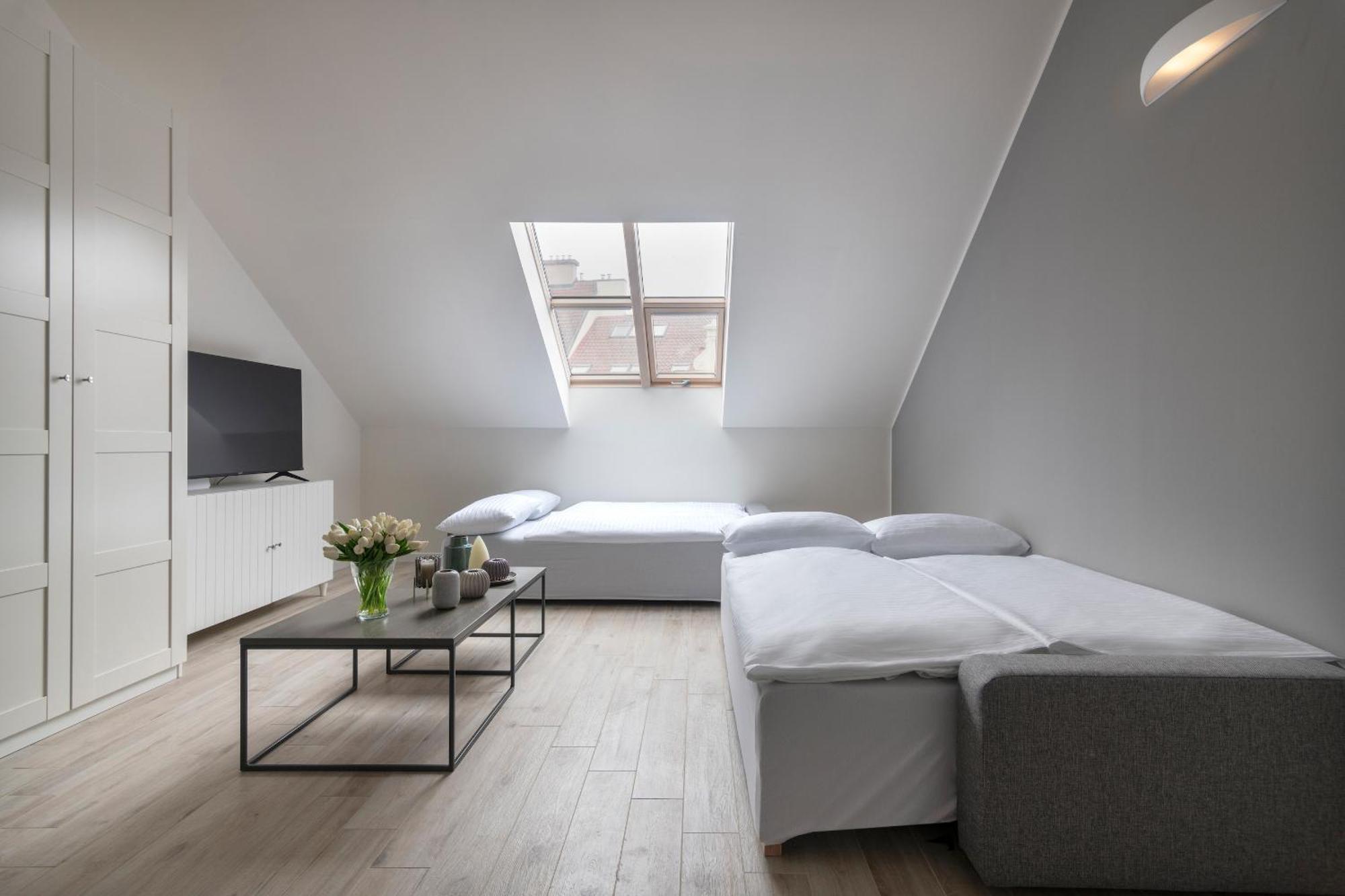 Kinsky Garden Apartments And Suites By Dwellfort Prága Szoba fotó